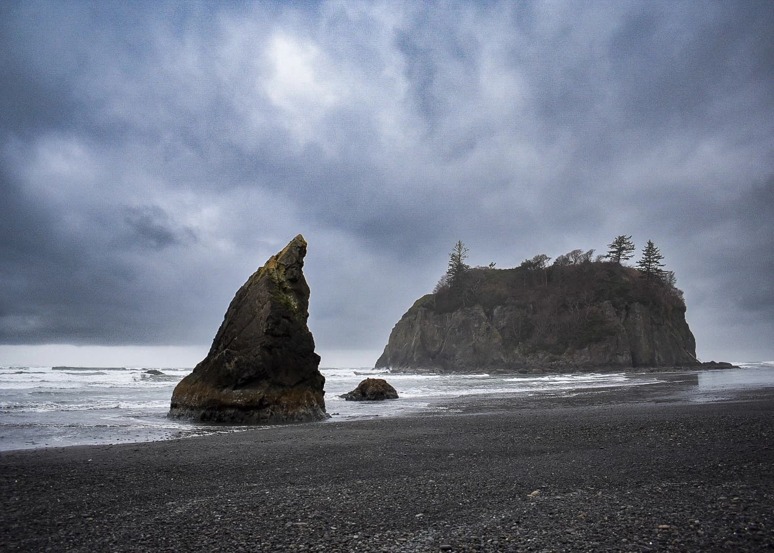 Moody Tacoma landscape photograph featuring dramatic lighting and urban lines