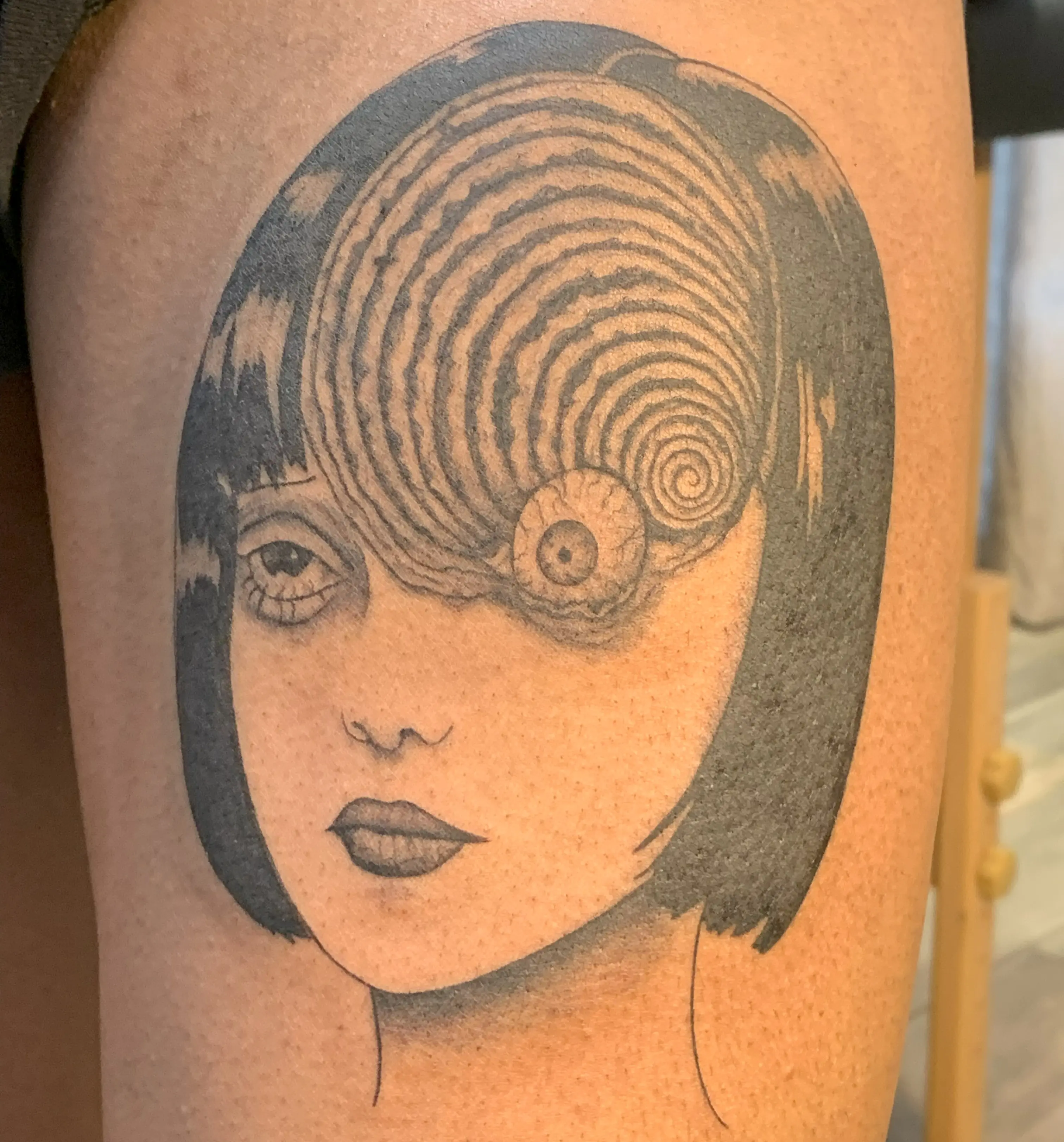 Manga panel style tattoo design with expressive character detail