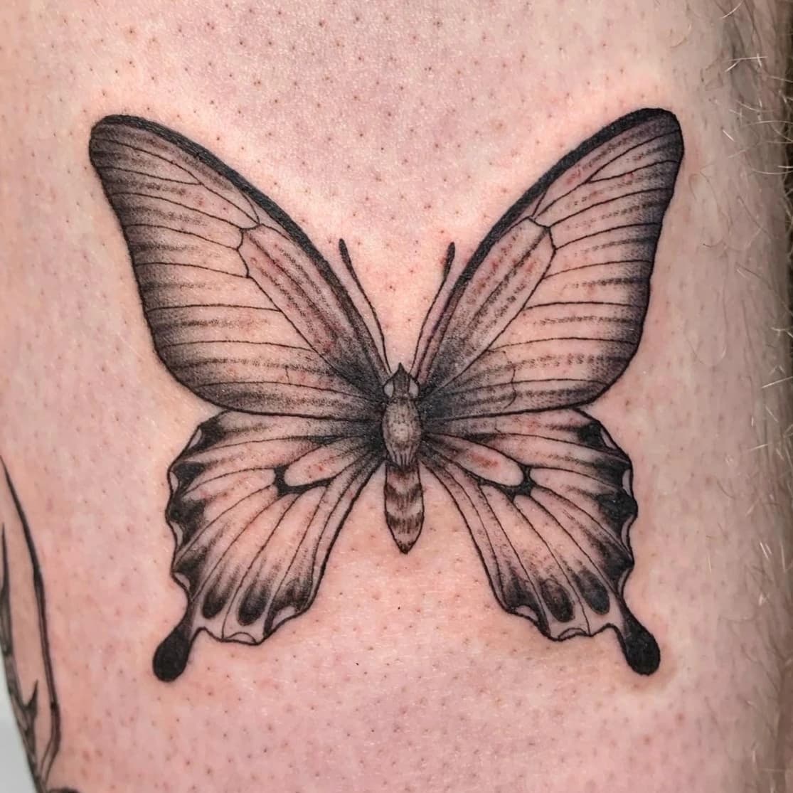 Heavy-contrast tattoo composition designed for striking visual impact