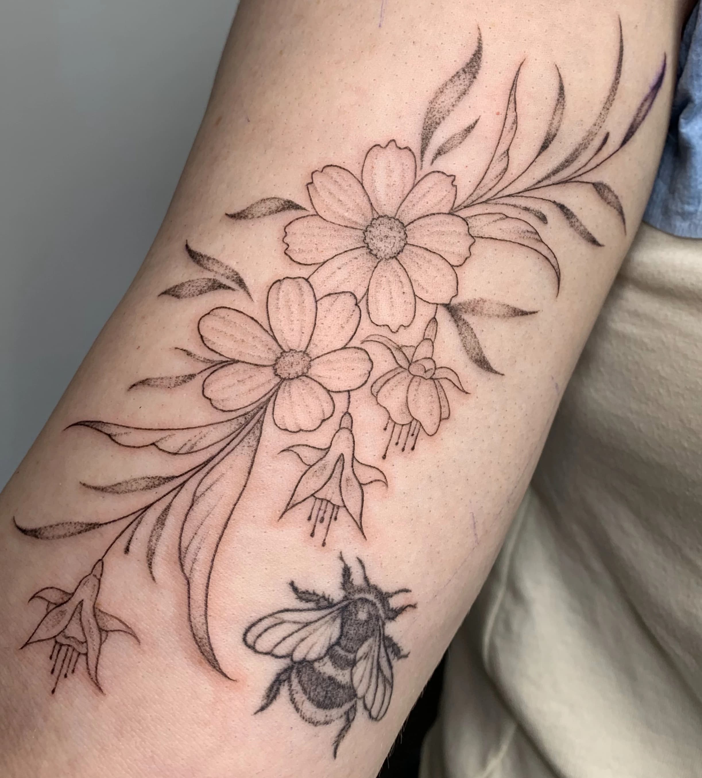 Delicate floral tattoo design drawn from scientific illustration references